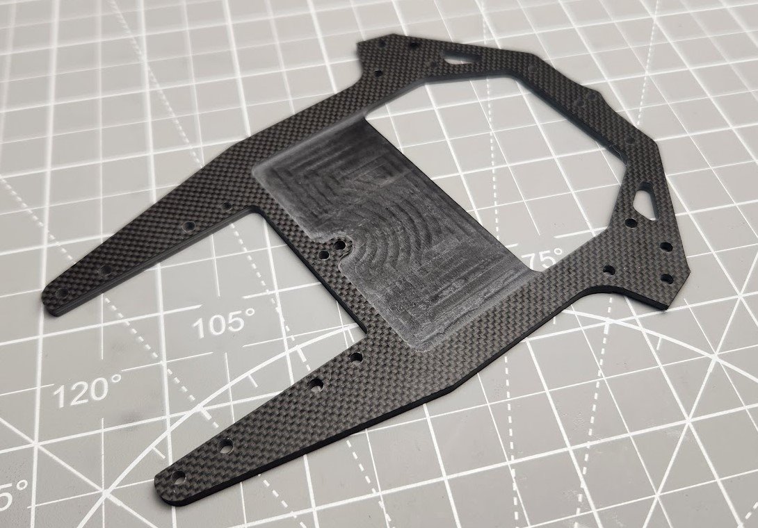 3mm carbon pocketed upper deck, milled 1mm for ride height, narrow track